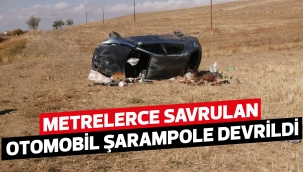 Metrelerce savrulan otomobil şarampole devrildi