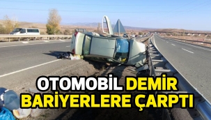 Otomobil demir bariyerlere çarptı