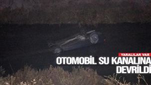 OTOMOBİL SU KANALINA DEVRİLDİ